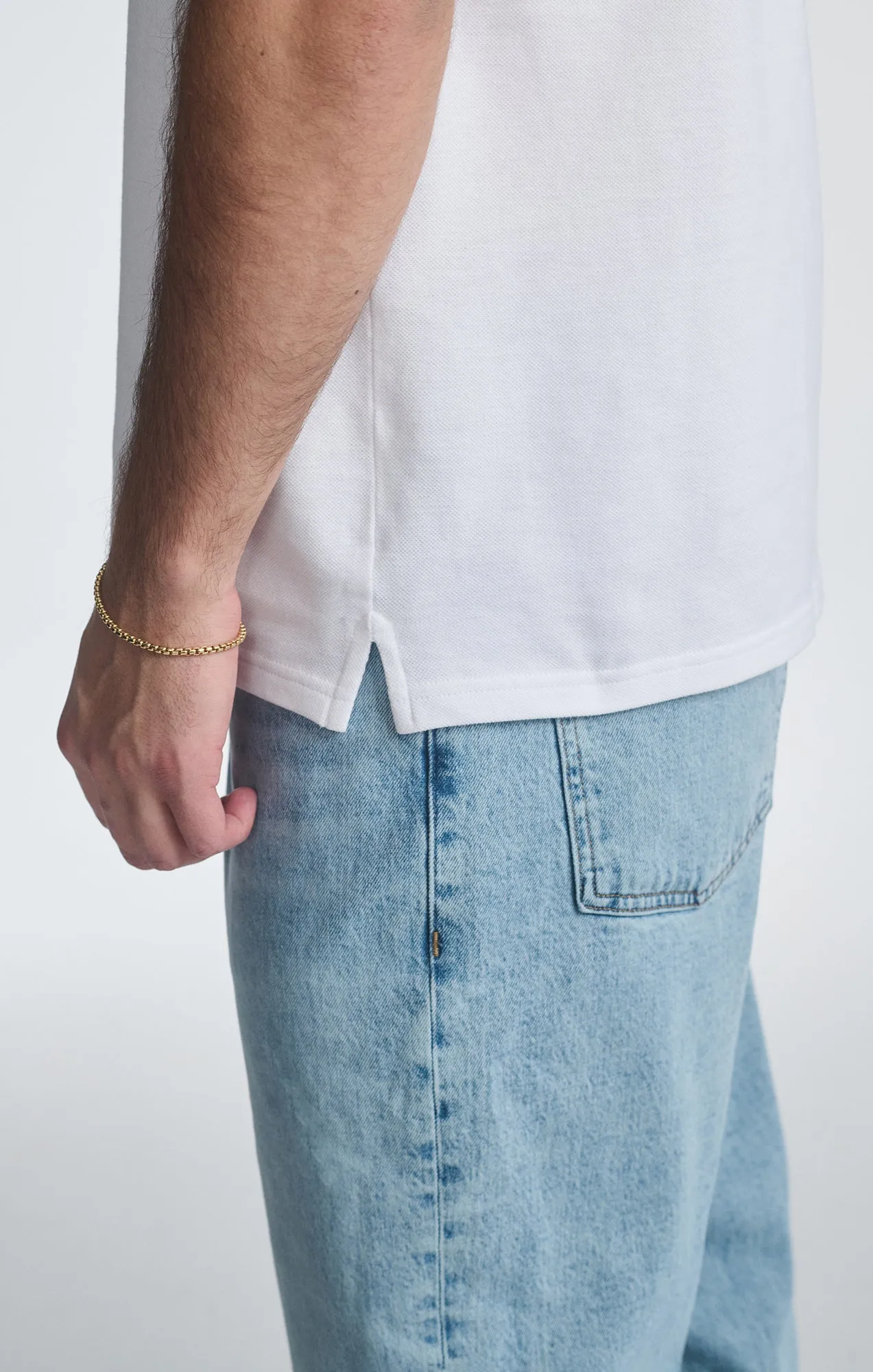 QUARTER ZIP POLO SHIRT IN WHITE